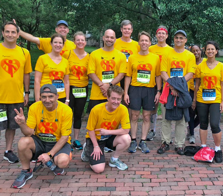 group of people with running shirts